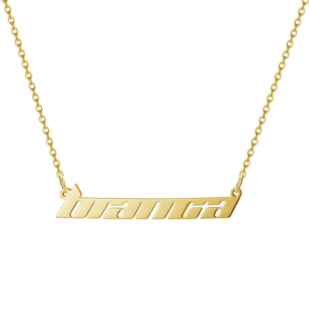 A gold-colored necklace with a pendant that says "branca" in a slanted font.