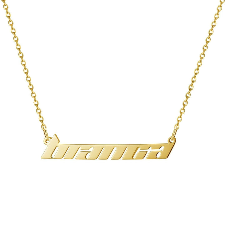 A gold-colored necklace with a pendant that says "branca" in a slanted font.